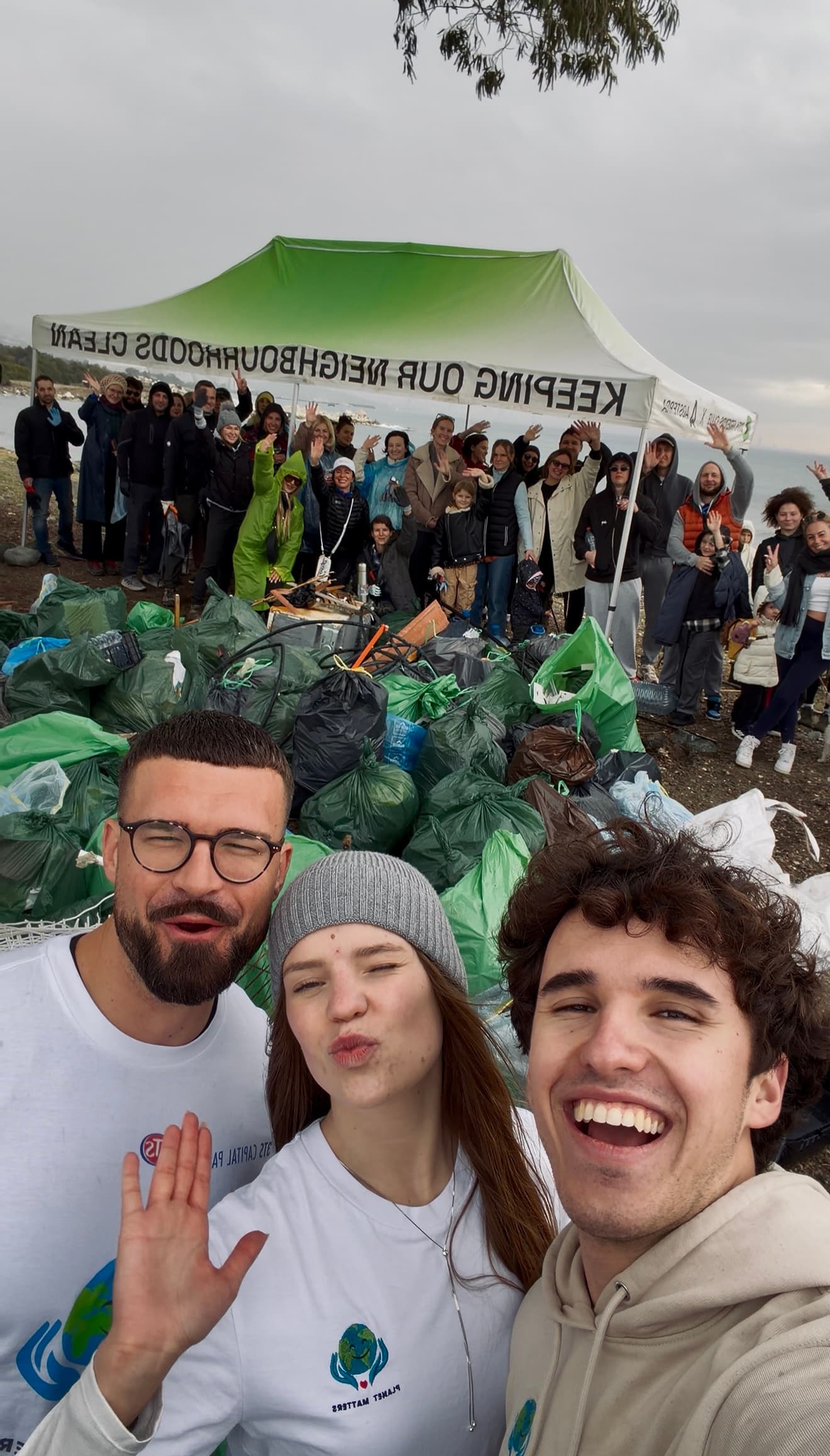 Volunteer collecting waste